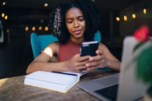 small_young_black_female_surfing_phone_taking_break_in_c_2025_03_25_16_26_48_utc_25ab4539a4